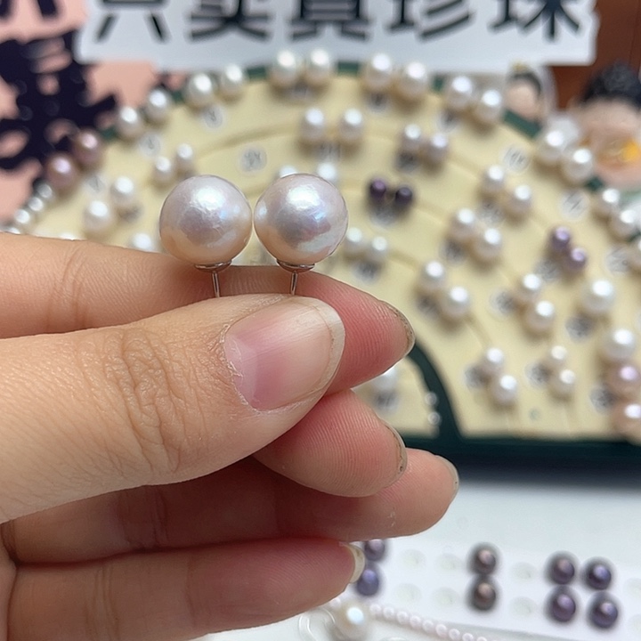 莫***己淡水珍珠耳饰银S925镶嵌