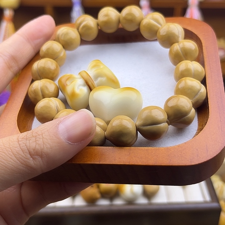 ℡***2手串猴头核桃屁桃设计款手持