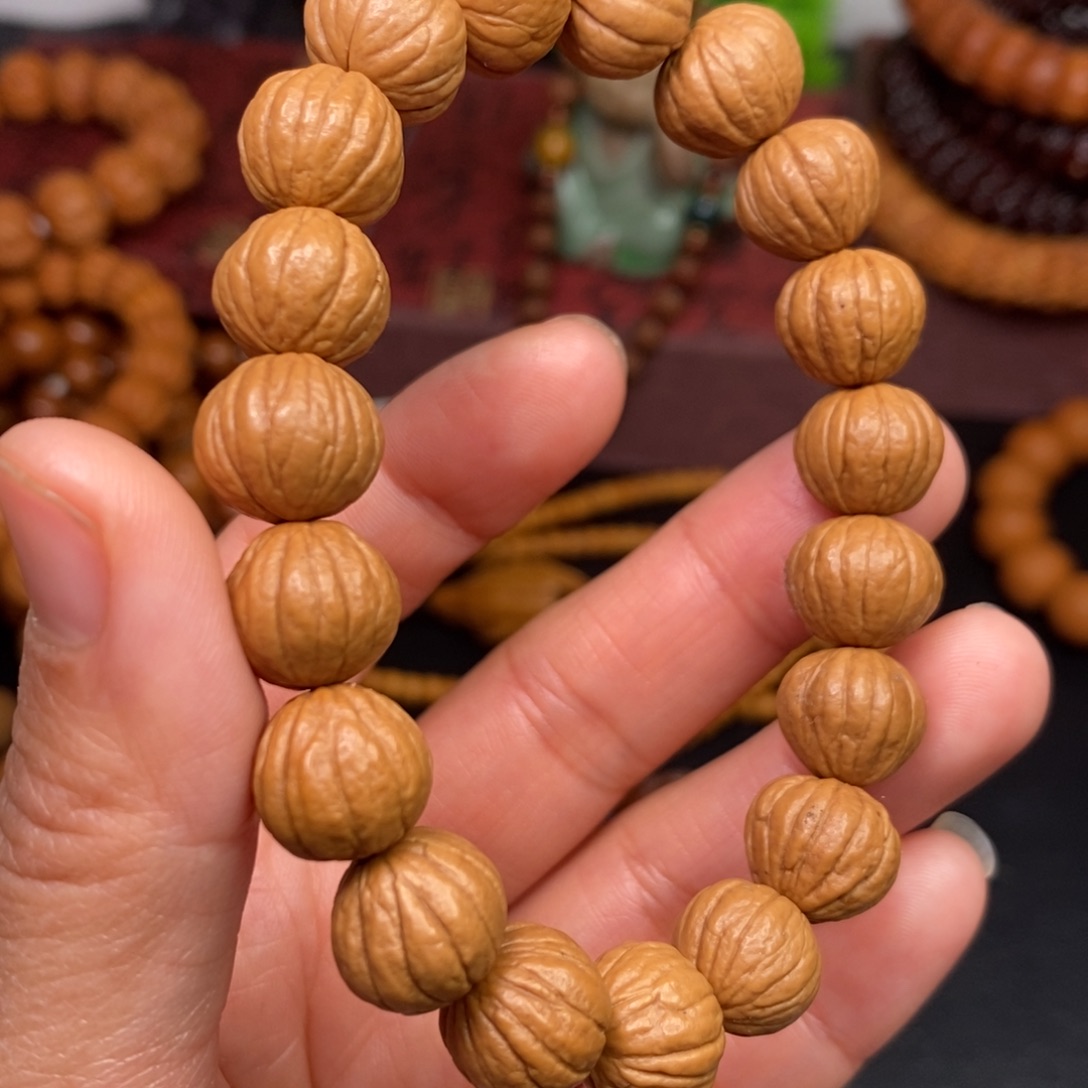 丁***丁猴头核桃吊坠橄榄猴头