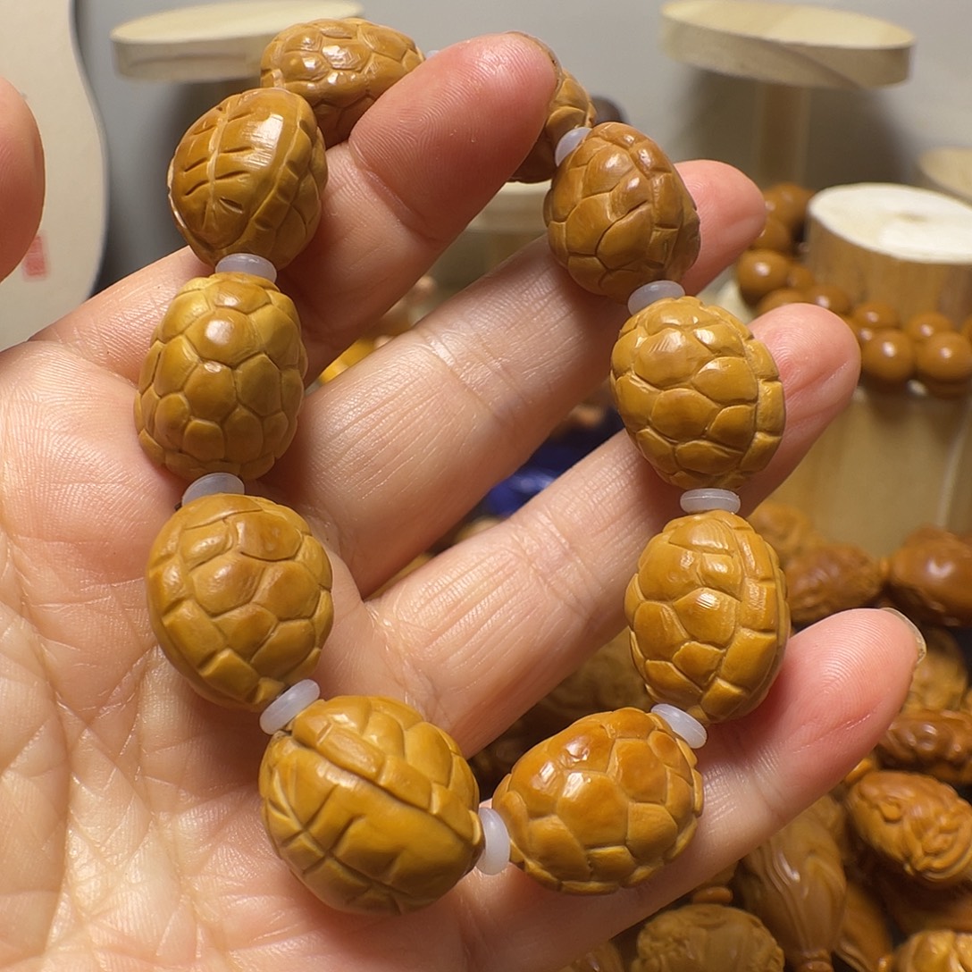 橄榄核手串qerttwrrtyy