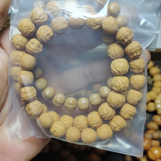 萬***.吊坠猴头核桃猴头手串