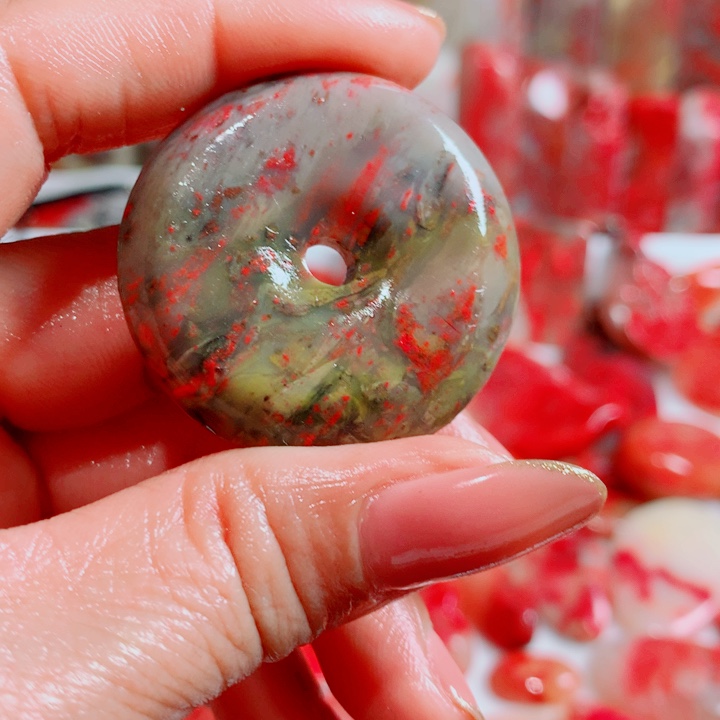 何***子巴林石巴林鸡血扣子