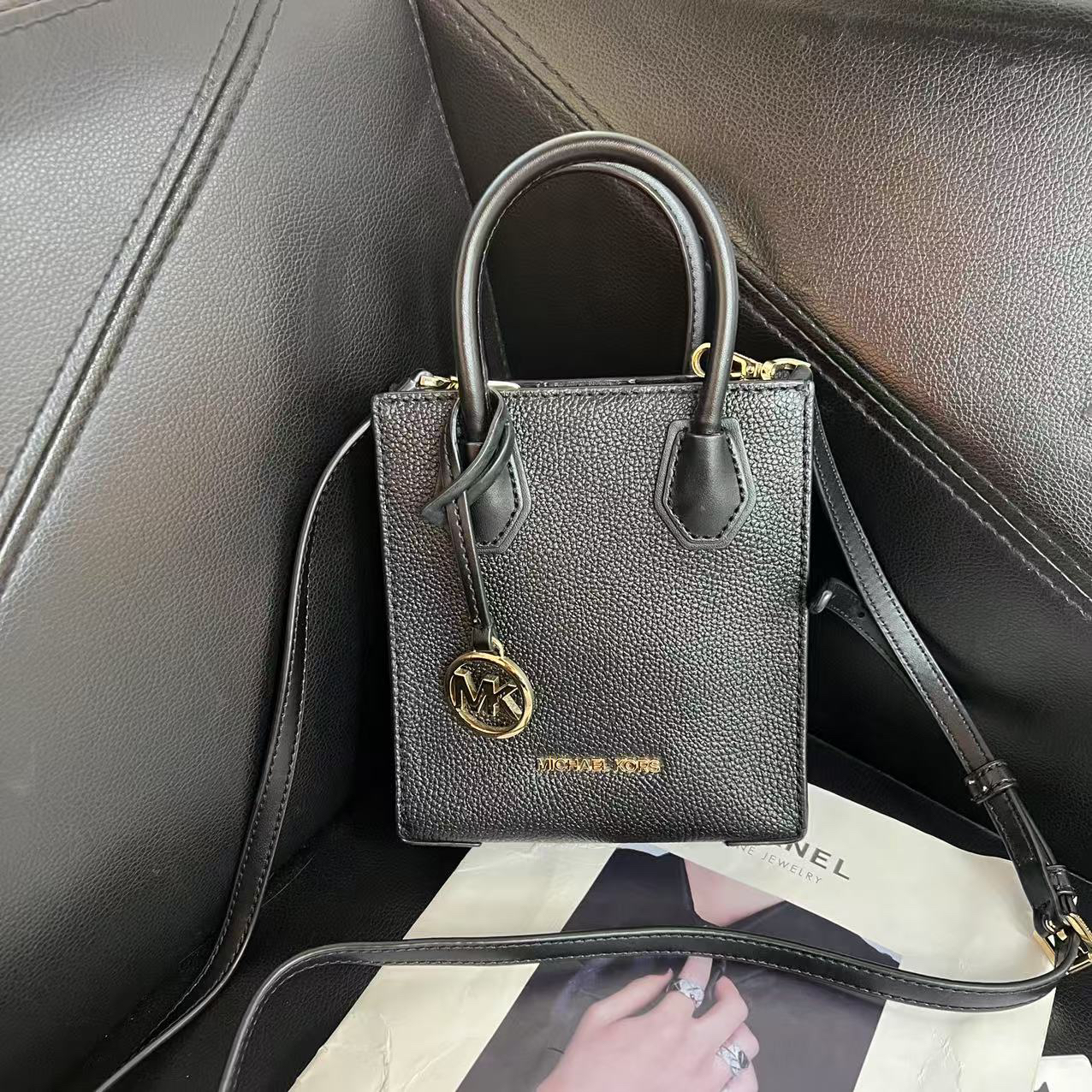 95新 MICHAELKORS/迈克高仕 捐金沉珠/琴谱包黑色单肩