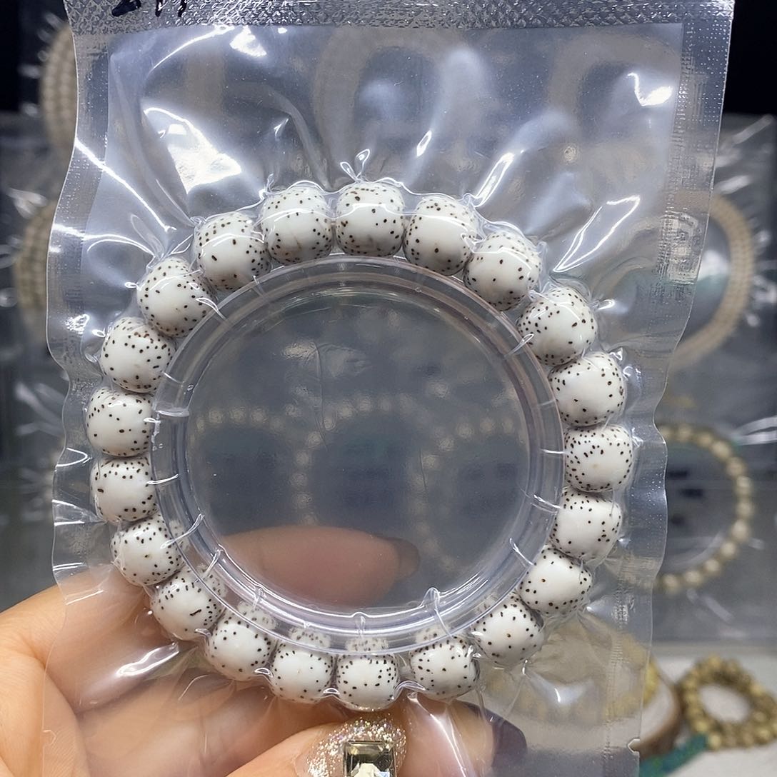 星月菩提手串10.6*9.6 原白 针尖星