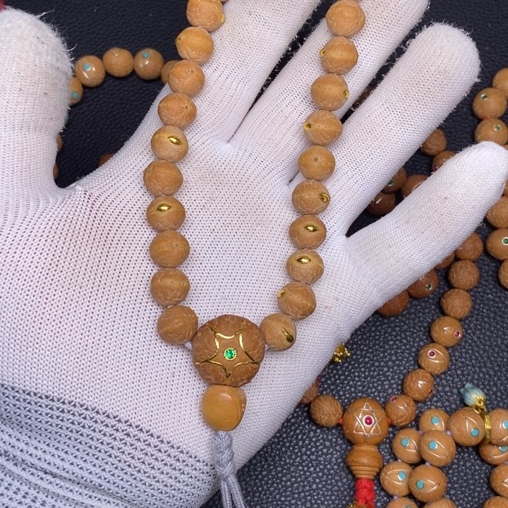 凤眼菩提手串?***?凤眼菩提实心籽金眼手持