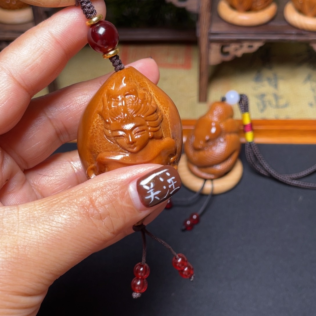 橄榄核吊坠美女蝴蝶穿配