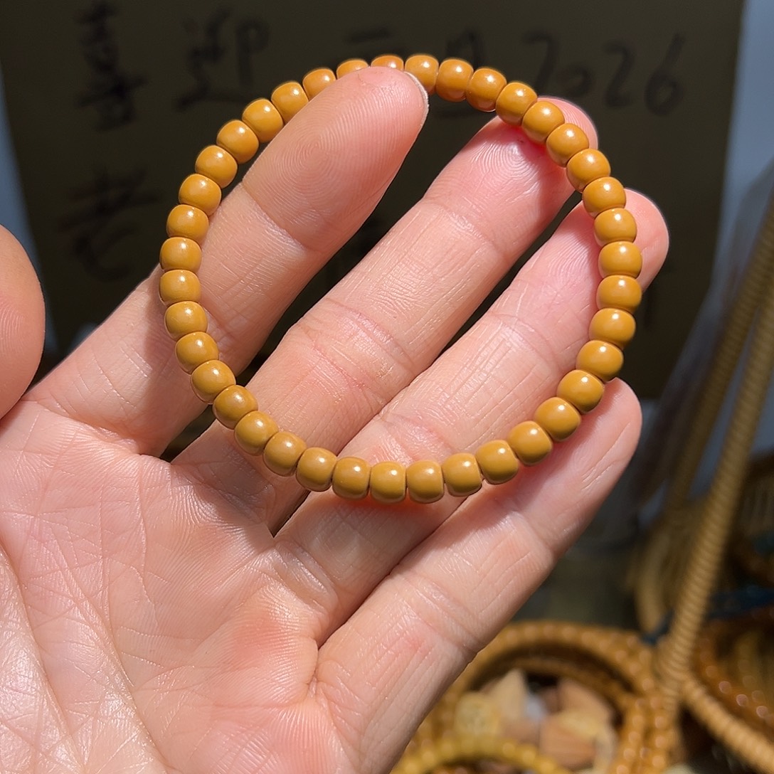 奶***油手串橄榄核老挝核尖单圈5.8