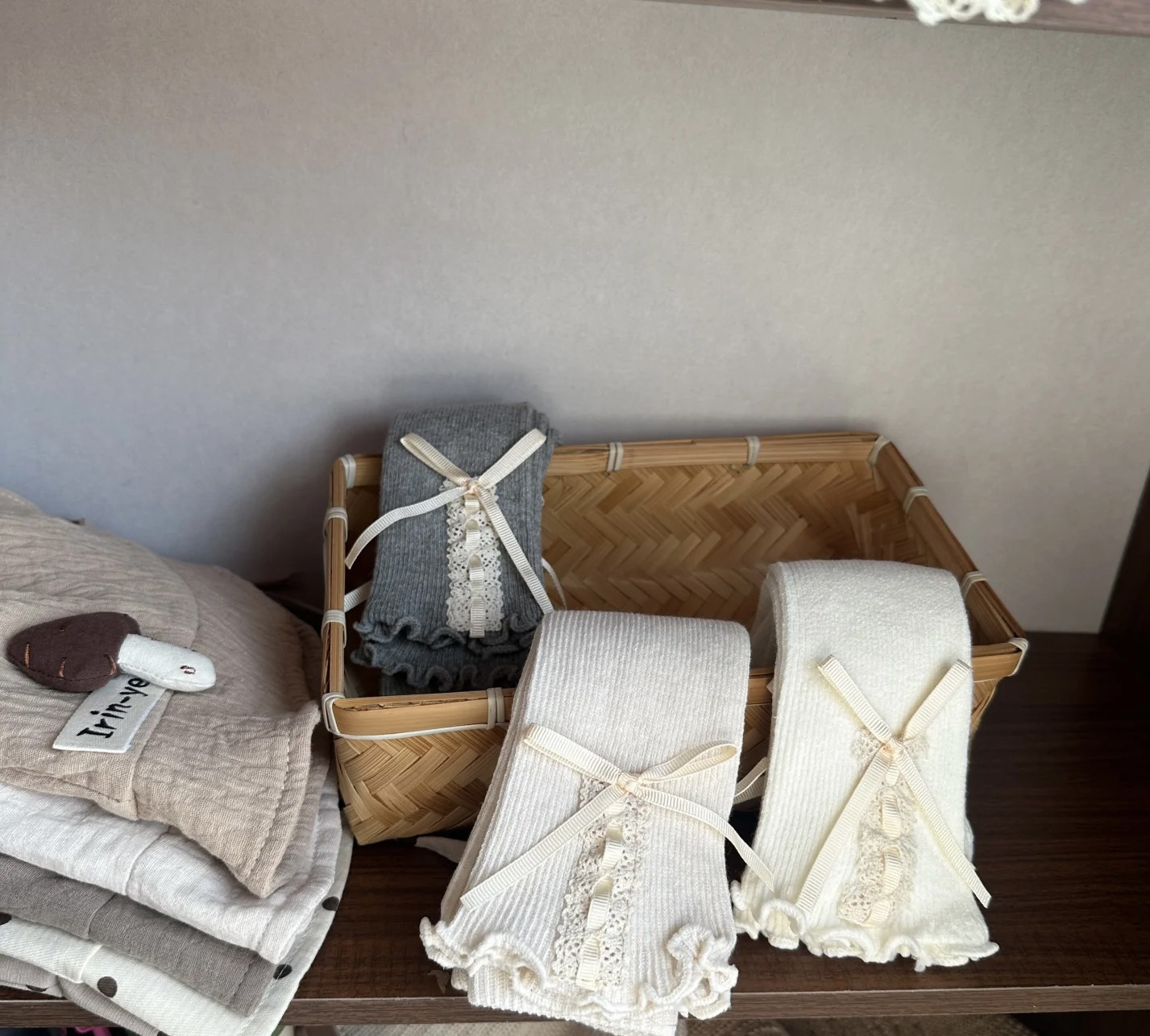 2025春款新款针织木耳边蕾丝蝴蝶结九分裤