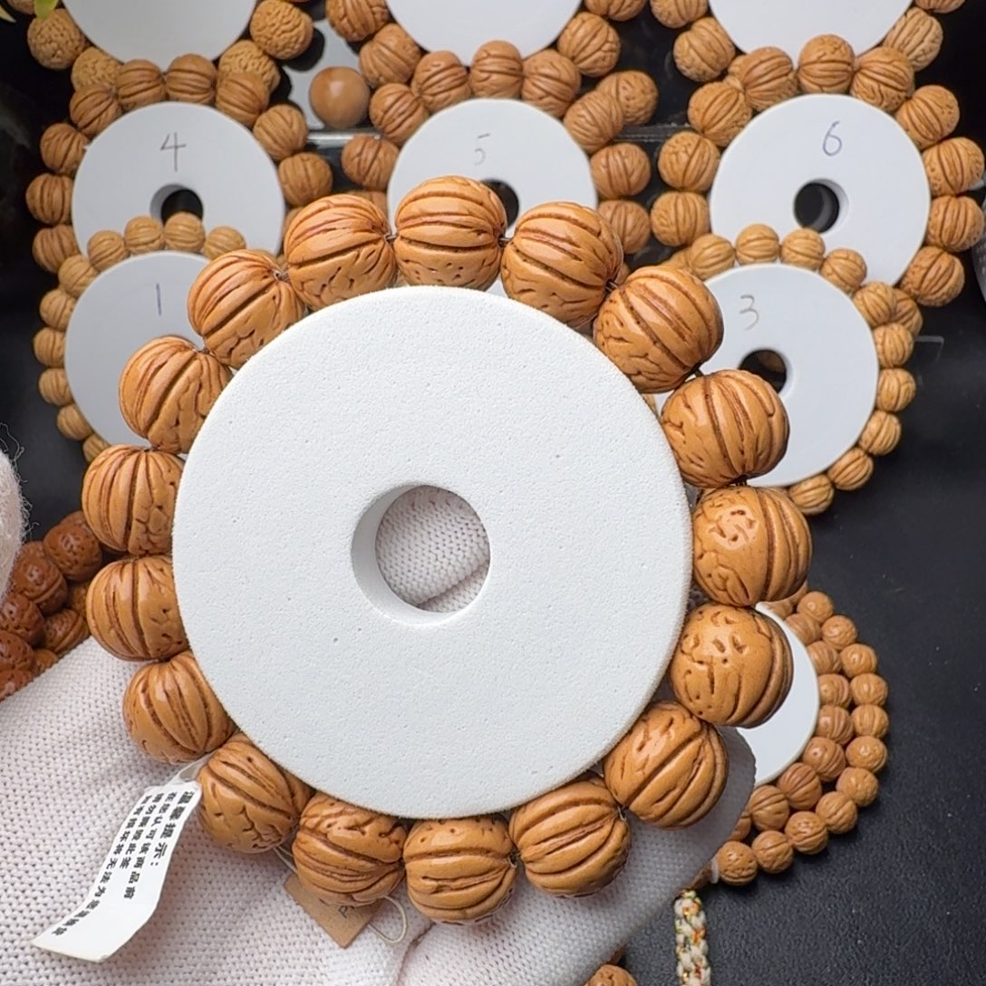 季***忆桃核手串老树金丹