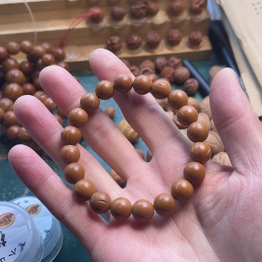 是****?桃核光珠手串1.0