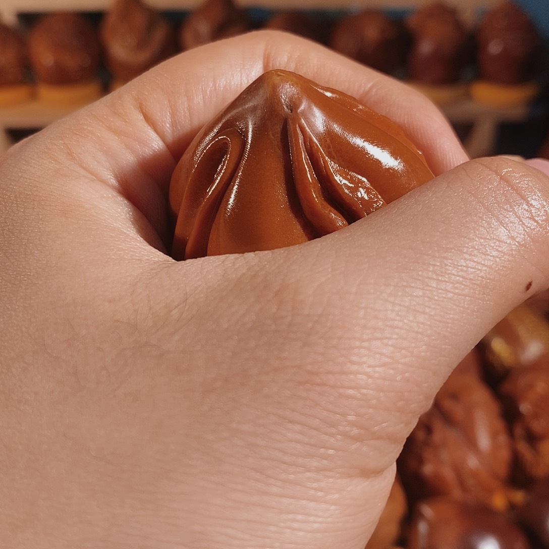 橄榄核把件回*生命四面