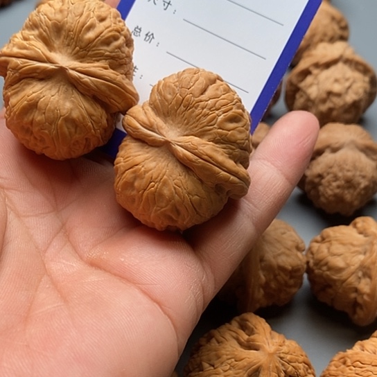 文玩核桃把件乐***乐平谷元宝