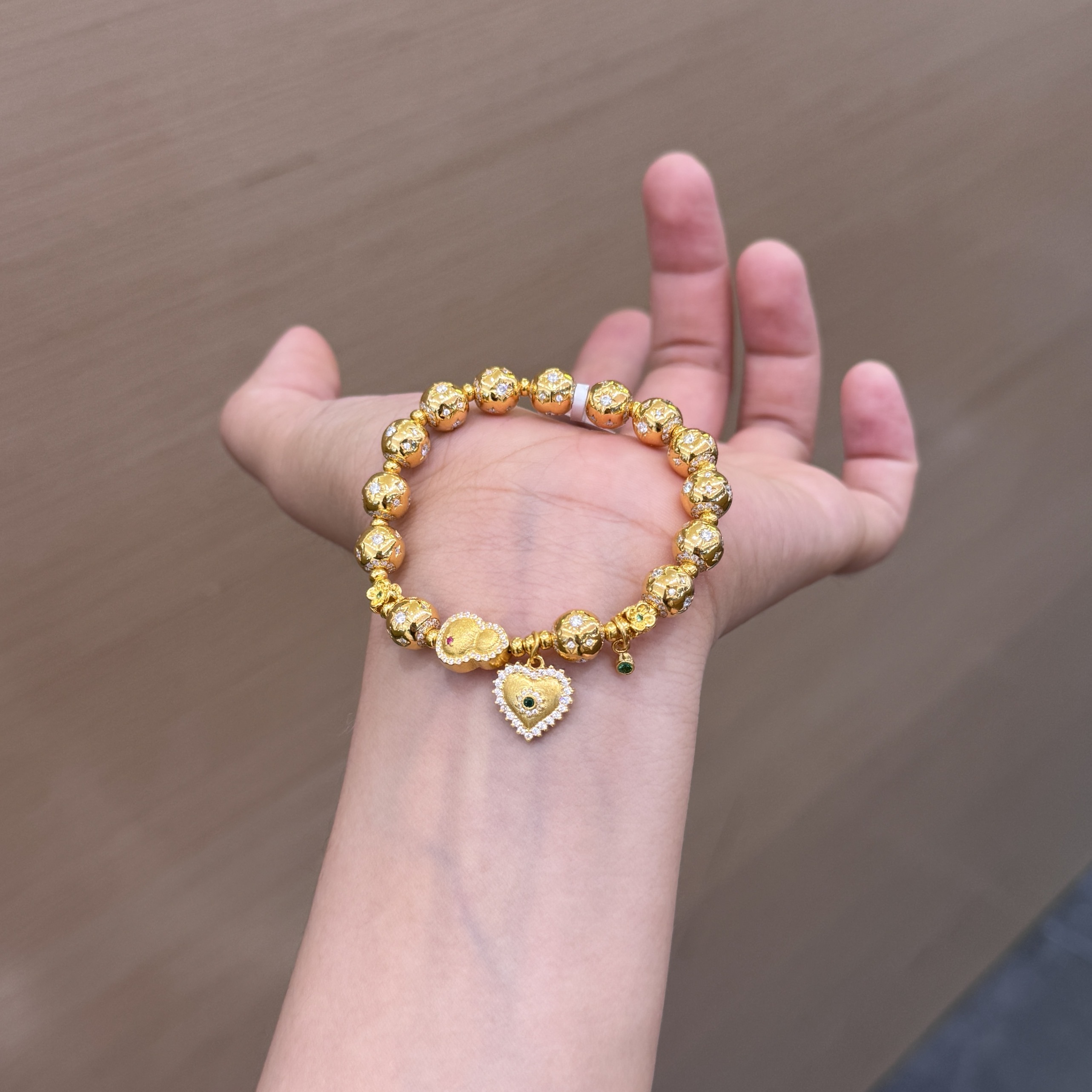 【菠萝珠宝】足金999 星芒搭配爱心 手串  金重：32.35克