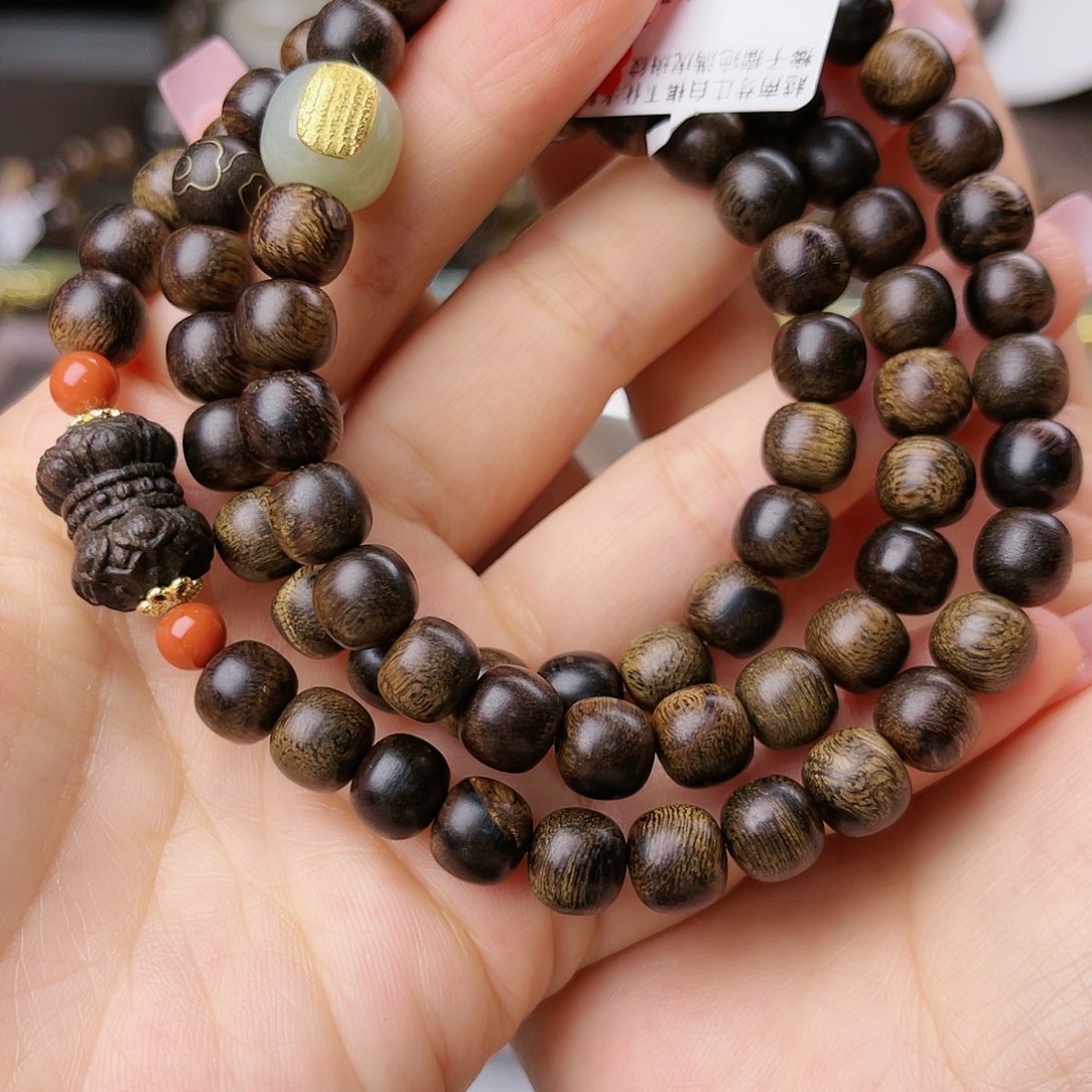 沉香手串球*妈越南芽庄老白棋玉化老料满留疤虎斑纹0.8