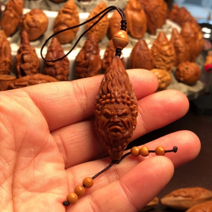 洋***钉橄榄核吊坠橄榄核雕刻的单子