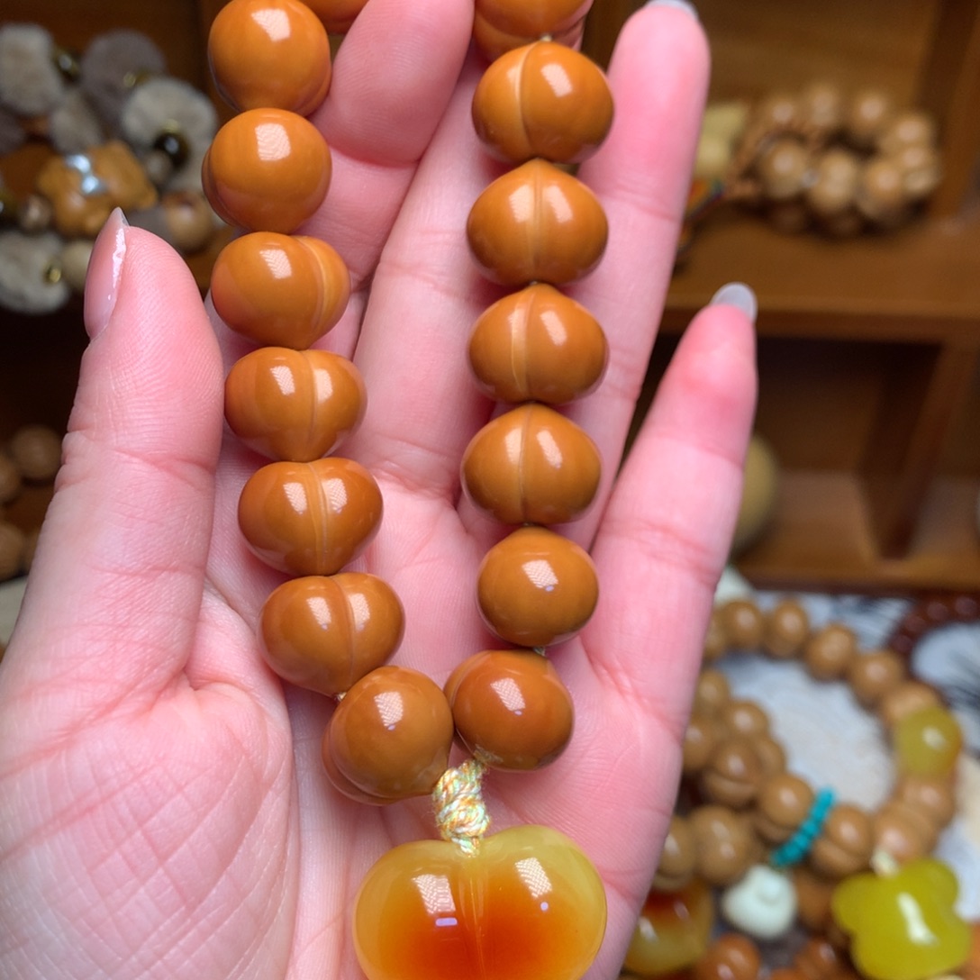 猴头核桃吊坠15玻璃底屁桃手持爱心