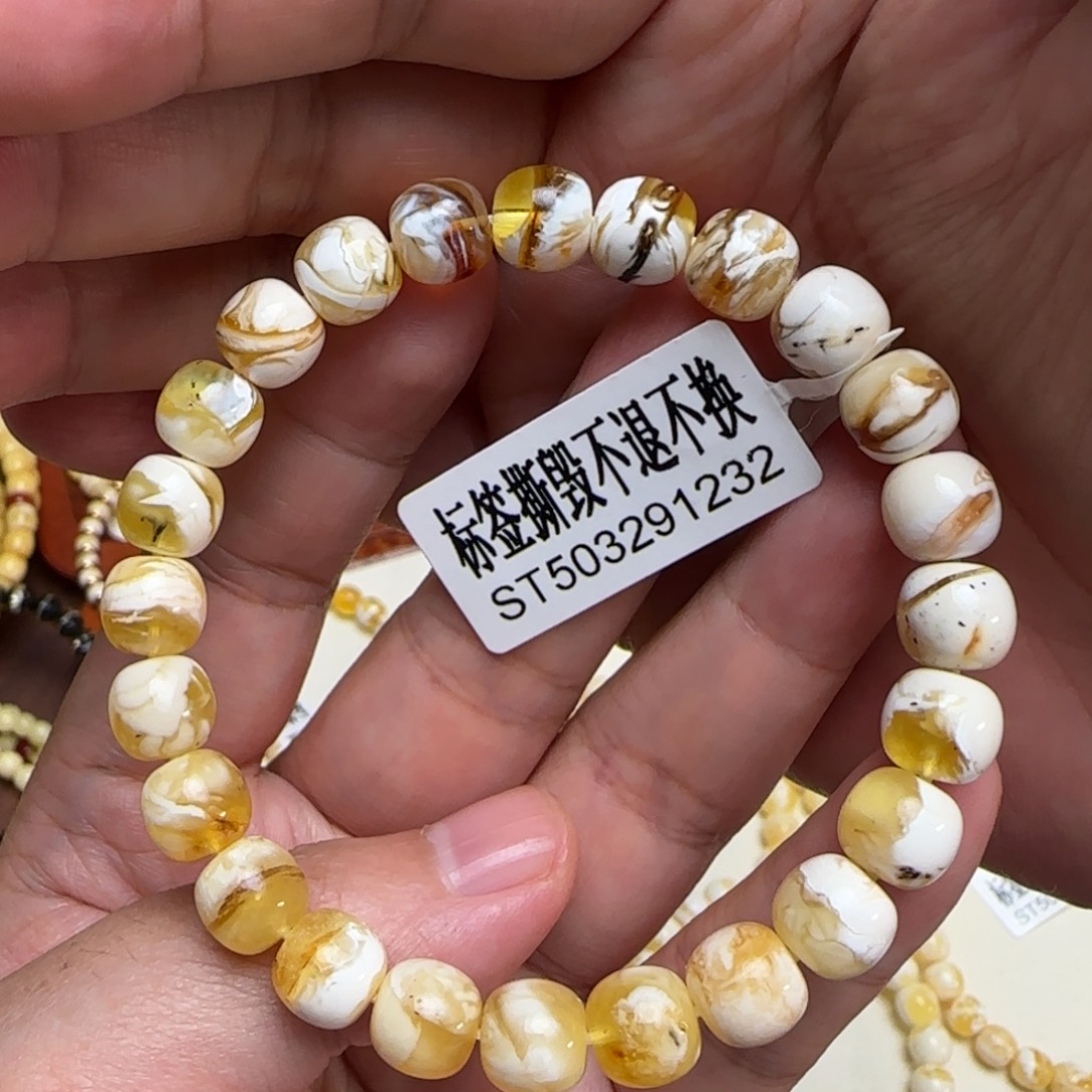 郑***哥琥珀未镶嵌珠宝奇石9咪