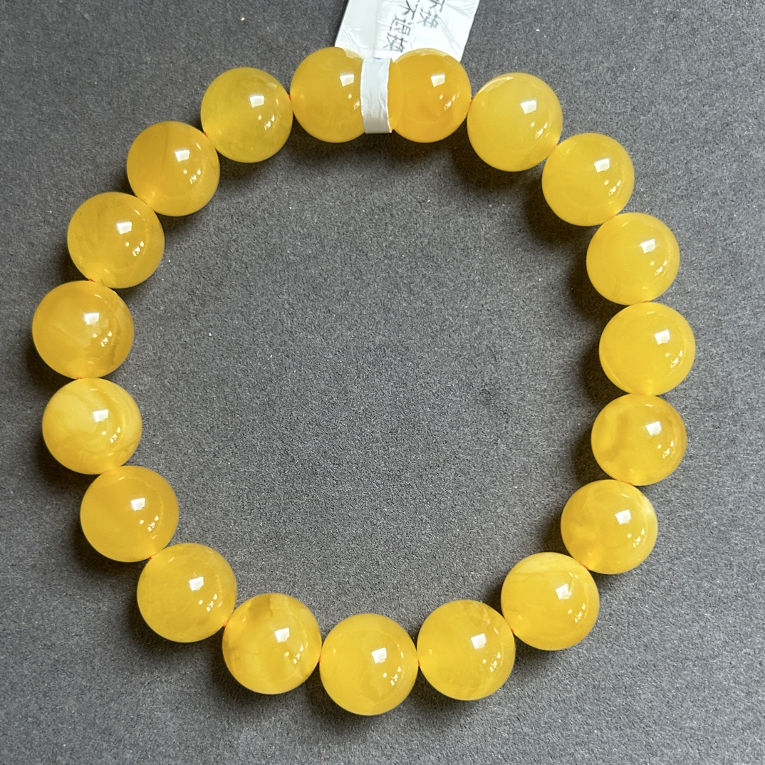 精品焦皮料满蜜鸡油红手串