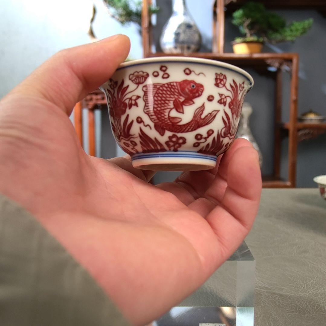 全红釉里红鱼藻主人杯