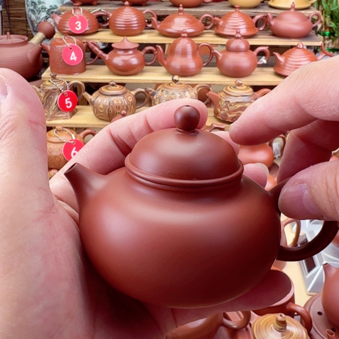 鱼***尖紫砂茶壶虚扁115 cc手拉