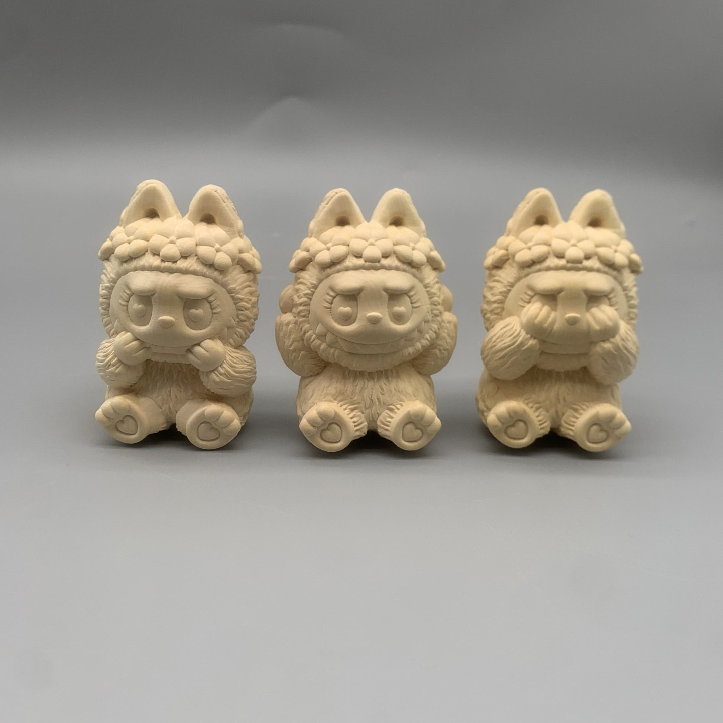 黄杨木木雕拉布布手把件实木招财随身文玩规格70/45/40一套