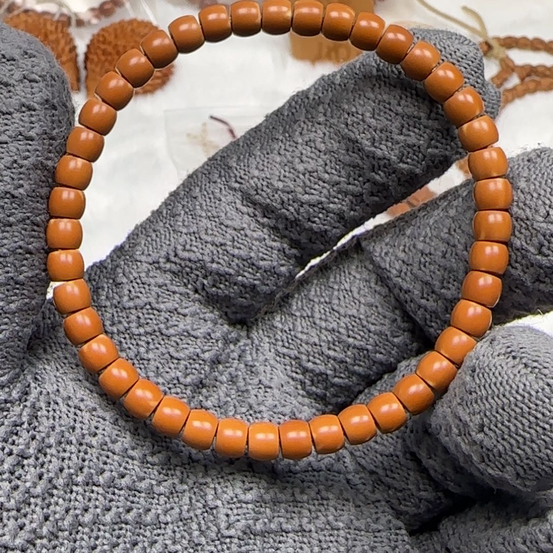 橄榄核手串老挝单圈直切微白5.7福利