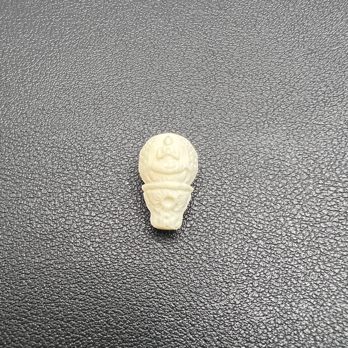 纯天然猛犸牙12佛像三通