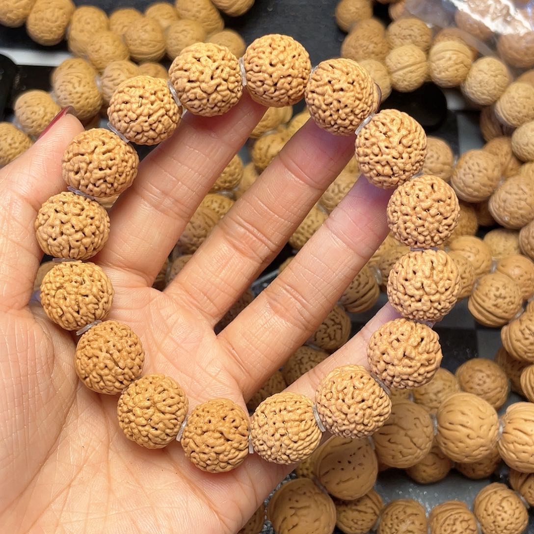 桃核吊坠17金刚手串