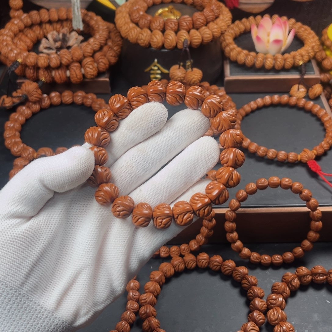 桃核吊坠轩*阁14双脊龙手串