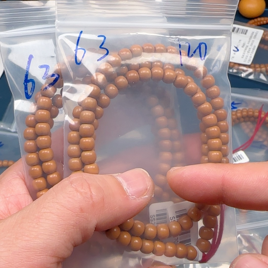 罗***动手串橄榄核老挝SS级核尖极限弧尺寸6.3×2