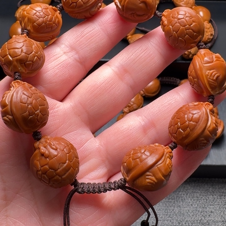 橄榄核手串/手链红料龙龟