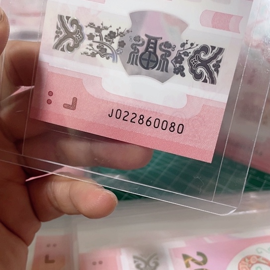 塑料2025年蛇钞号码如图所示pmg包68分