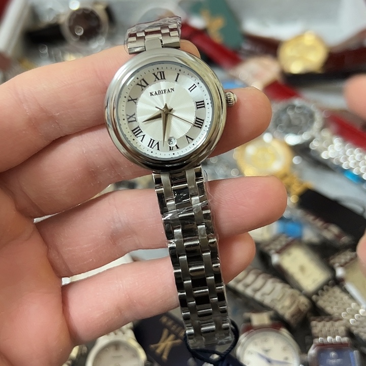 曾***赞钢牛皮（革）钢石英机芯