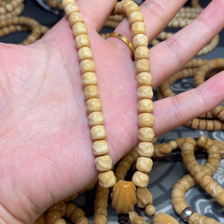 龙眼菩提吊坠_龙脊菩提 奶酪无相手持36颗+三通 8mm