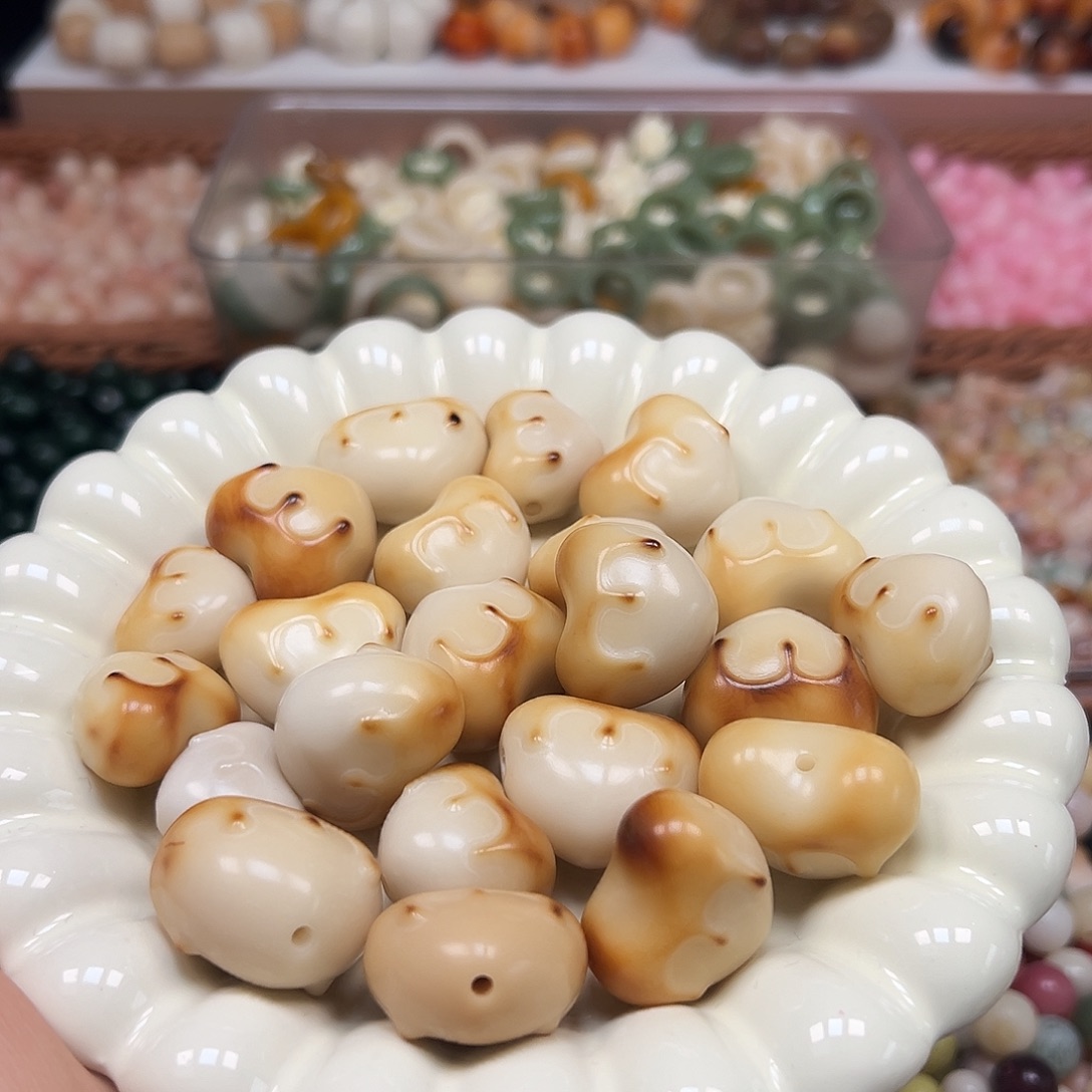 手串菩提根/象牙果瑕疵炭烤m爱心10颗有裂