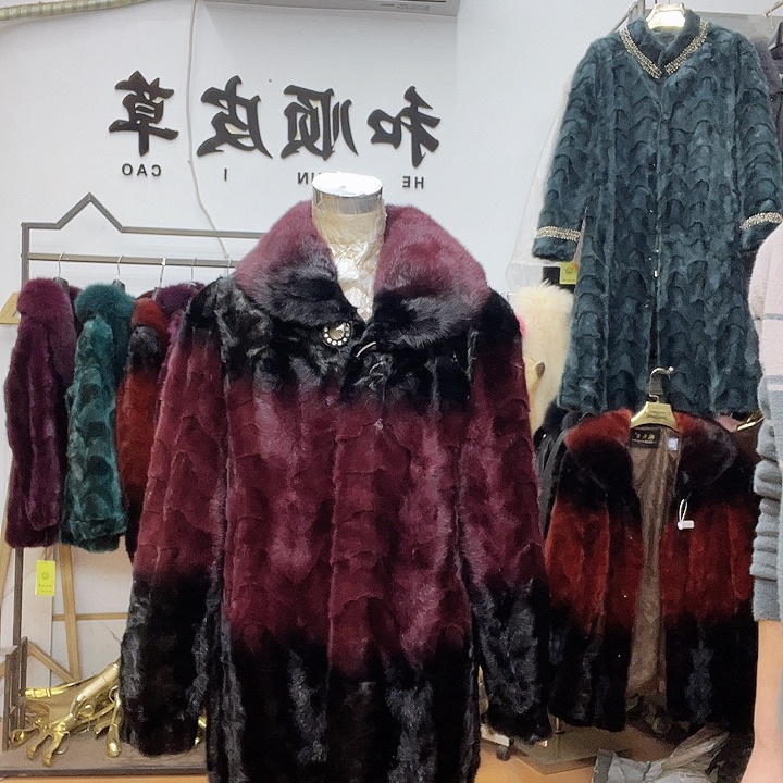 幸**心商场断码拼貂衣服