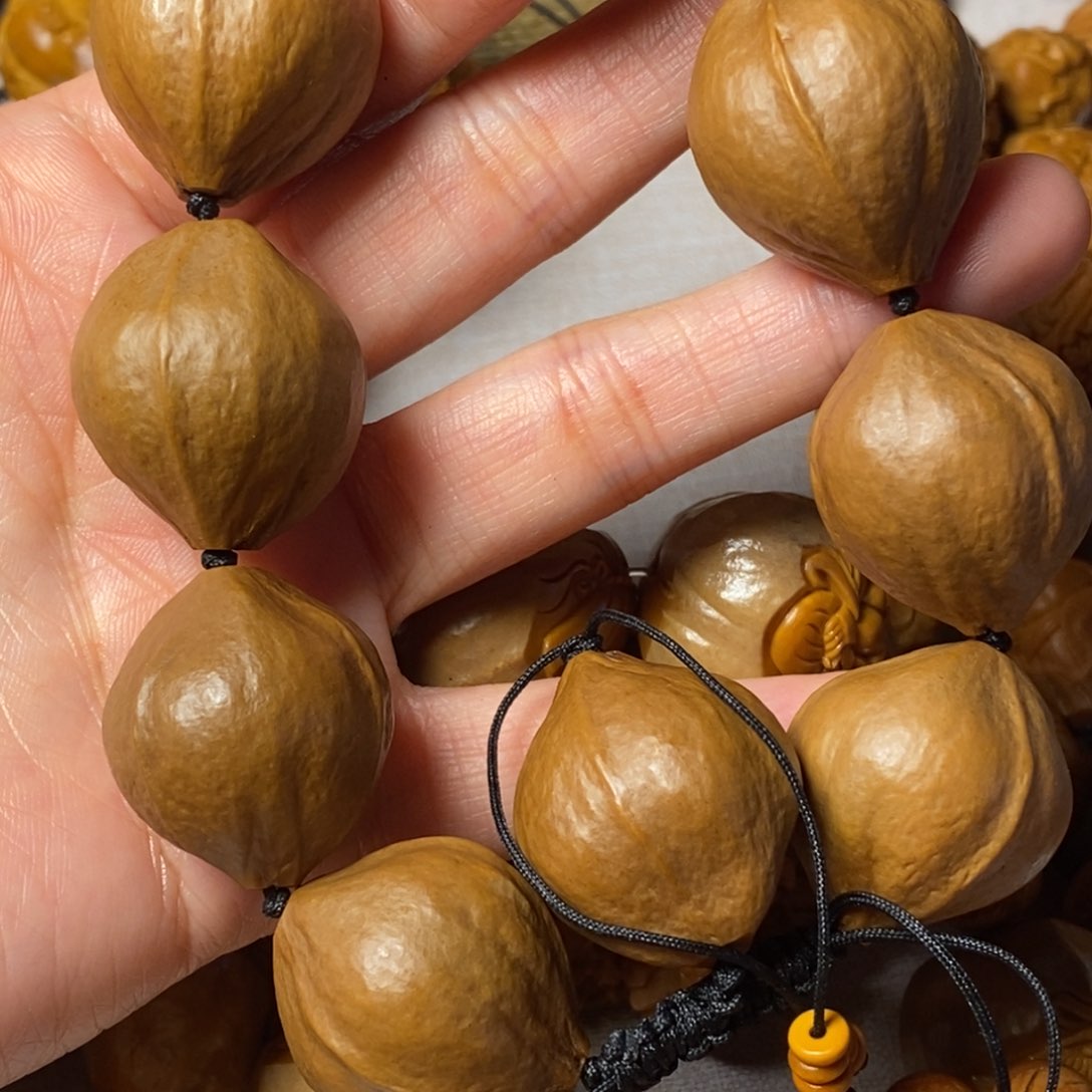 橄榄核手串/手链王*包衣大素核2.4左右
