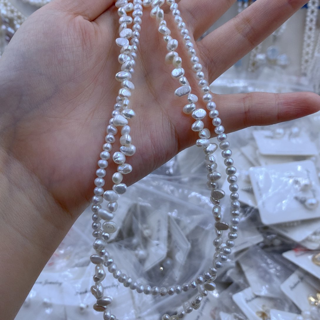 颈饰合金淡水珍珠飞**星