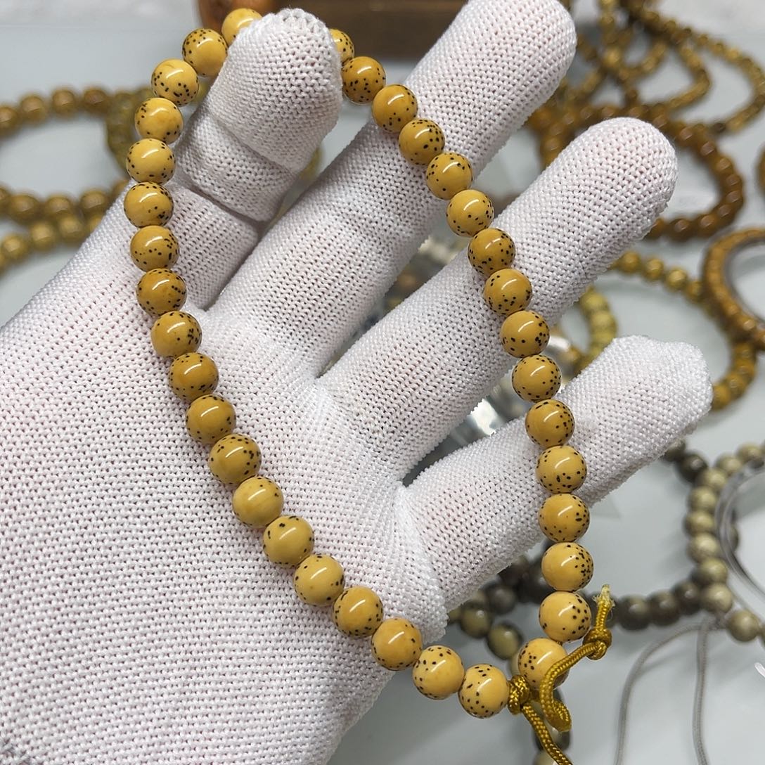 星月菩提手串鸡油黄圆珠手持7.7