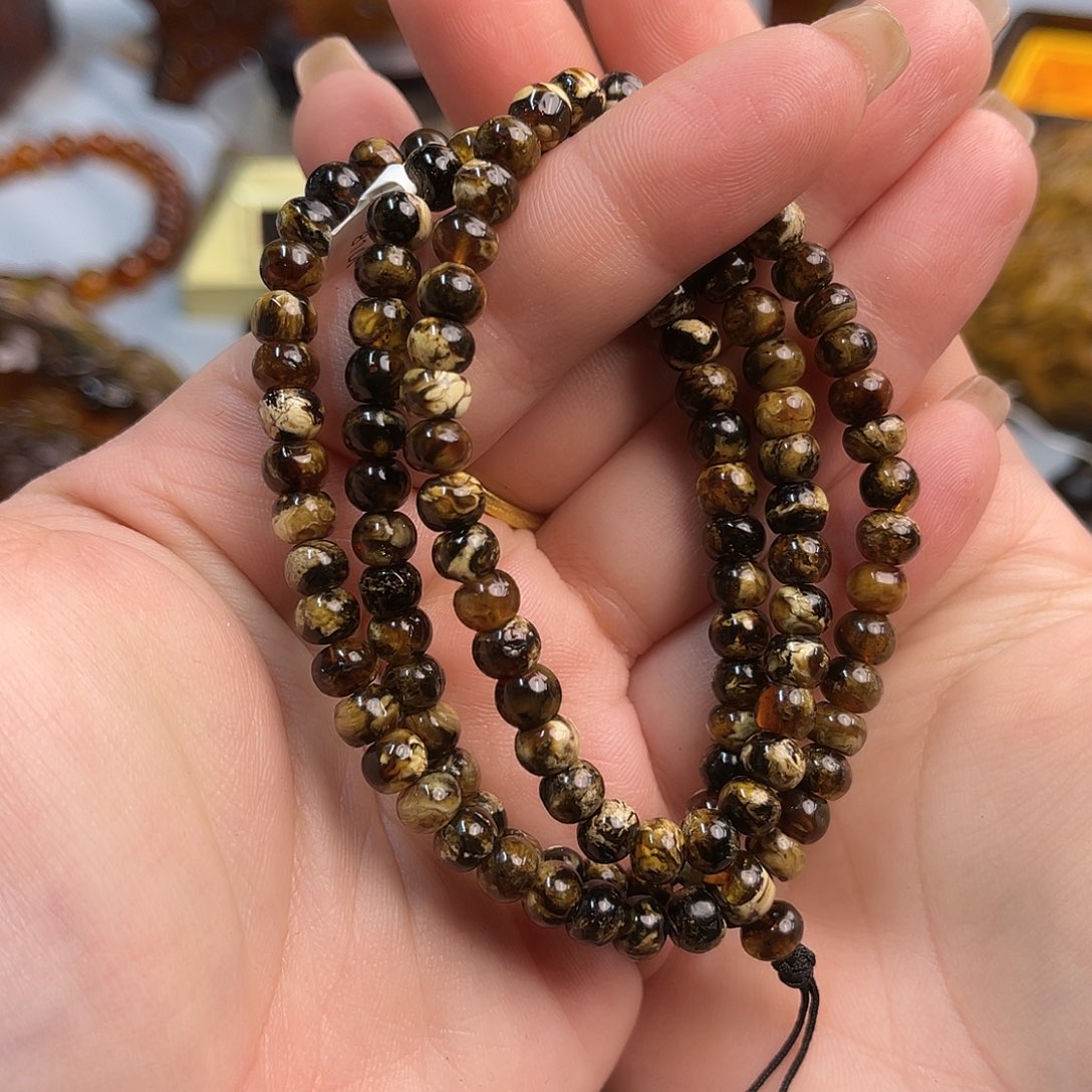 琥珀吊坠(不含链)未镶嵌抚顺琥珀6+干白花108