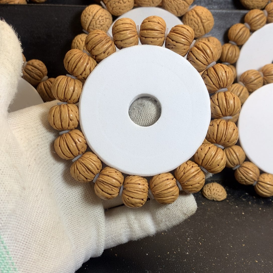 『***生桃核手串17树王纽扣