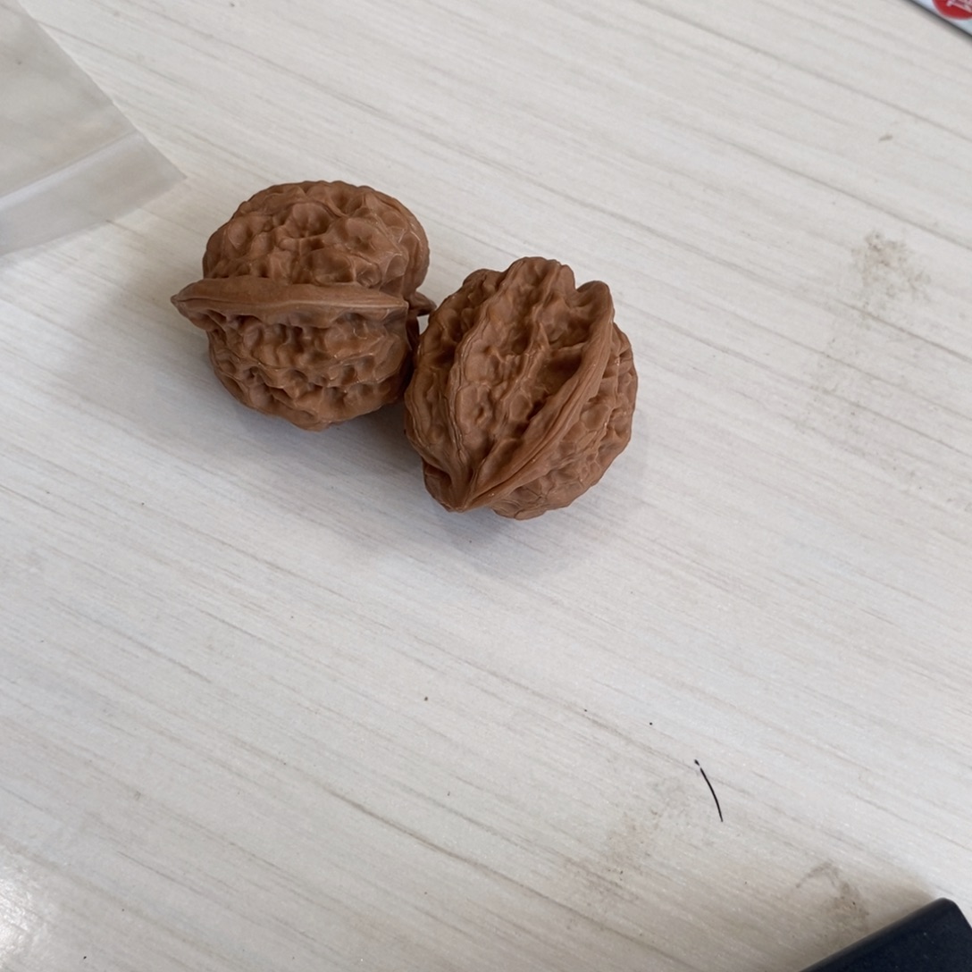 文玩核桃吊坠盘石