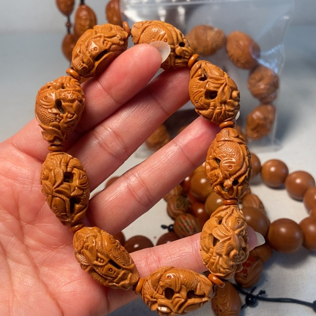 橄榄核手串/手链荷花鱼