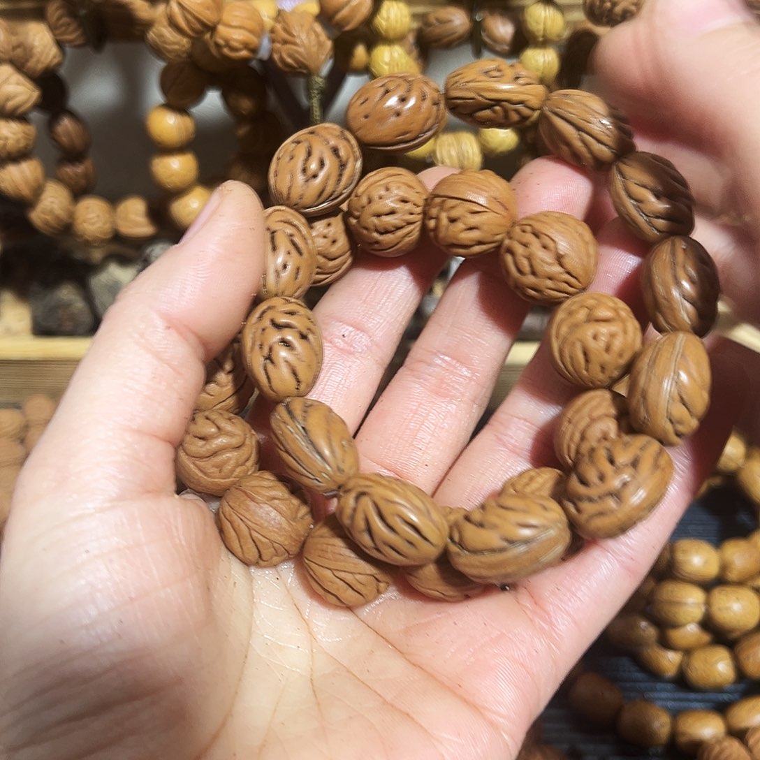 风***相野生桃桃枭手串精品