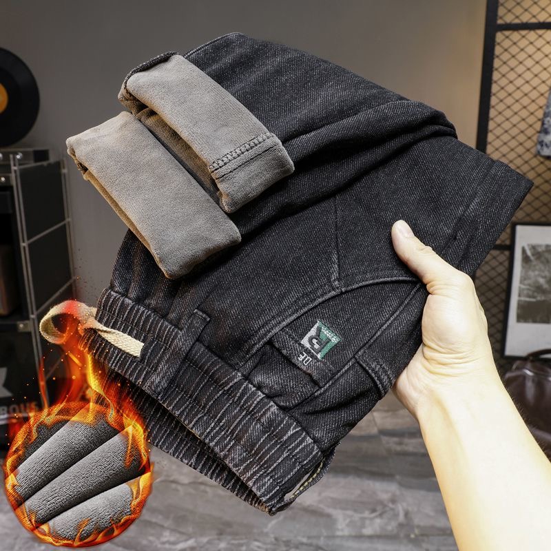 2025年秋冬加绒加厚男士牛仔裤松紧腰雪狐绒聚热抗寒潮流轻奢长裤