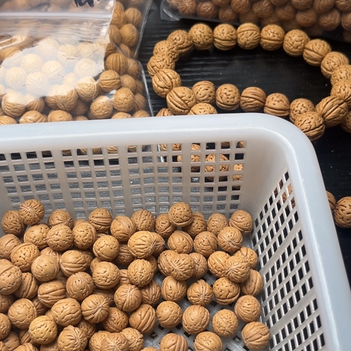 白***鈺文玩核桃吊坠小桃核散籽批发