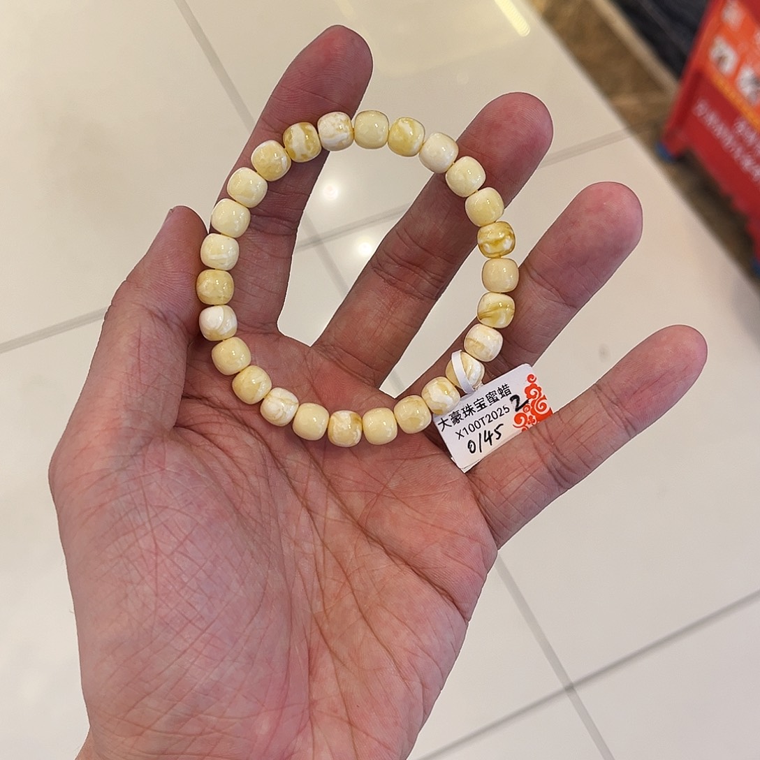 阿***.蜜蜡未镶嵌手链奶白花8mm