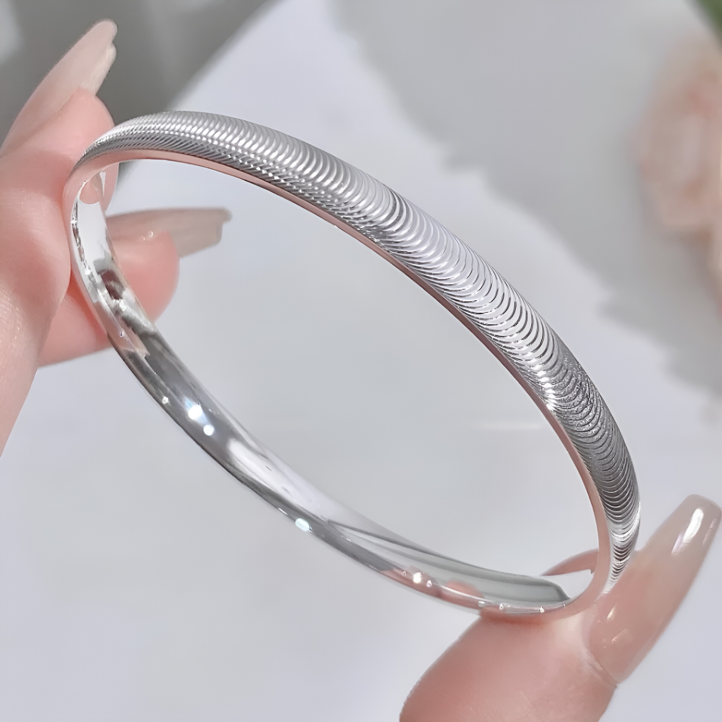 足银手镯 A128足银999.9【猫眼】闭口纯银手镯波光粼粼