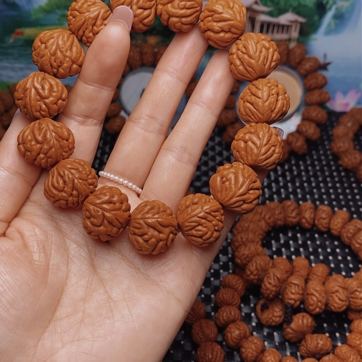 桃核手串土**戈龙纹桃核