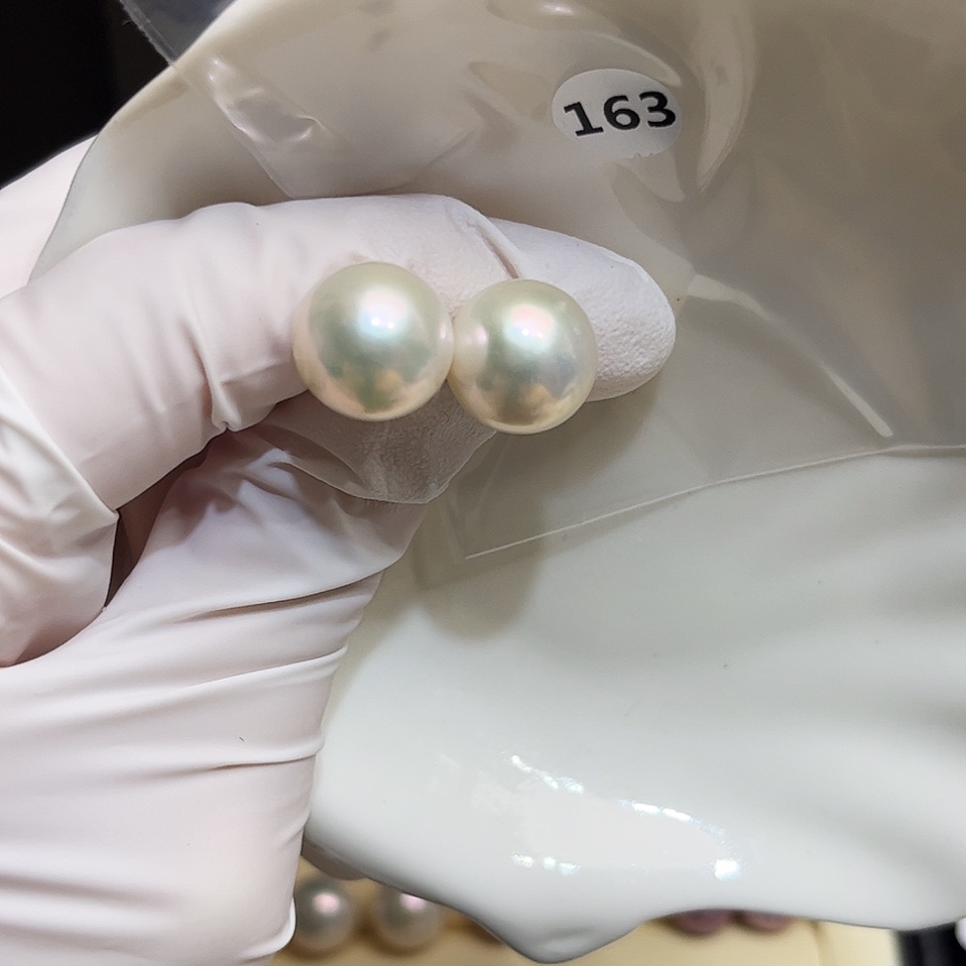 胡***华淡水珍珠银S925镶嵌耳饰